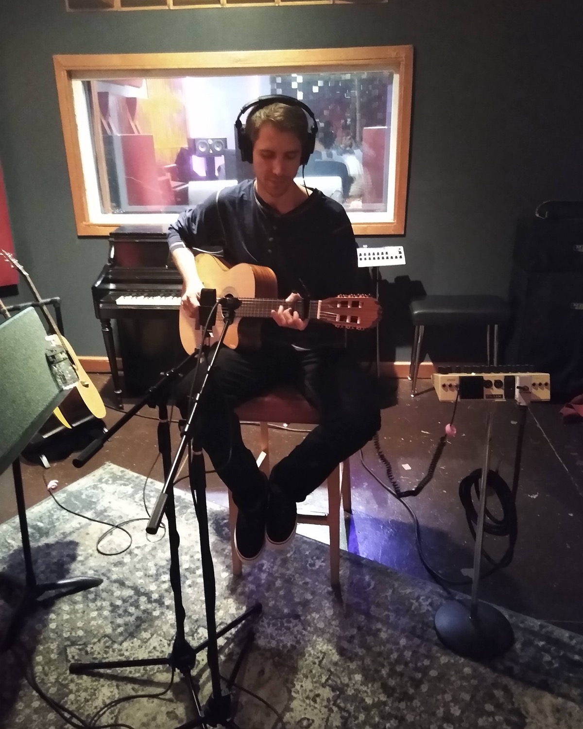 Samuel Pickens tracking acoustic guitar